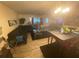 Spacious living room area showcasing comfortable seating and natural light at 8951 Stonebridge Blvd, Douglasville, GA 30134