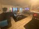 Comfortable living room with sleek flooring, ample seating, and natural lighting at 8951 Stonebridge Blvd, Douglasville, GA 30134