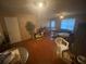 Open living room with wood laminate flooring, providing ample space for furniture at 8957 Stonebridge Blvd, Douglasville, GA 30134