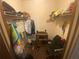 Walk-in closet with clothes, shelving, and a desk/storage unit at 8957 Stonebridge Blvd, Douglasville, GA 30134