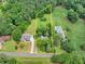 An aerial view outlines a property with homes and a sprawling yard, perfect for future development or recreation at 4444 Cannon Sw Rd, Loganville, GA 30052