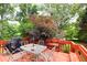 View of back deck with furniture and grill at 4444 Cannon Sw Rd, Loganville, GA 30052