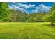 Vast, well-maintained backyard offering plenty of space for outdoor activities and entertainment at 4444 Cannon Sw Rd, Loganville, GA 30052