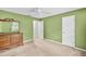 Comfortable bedroom features ceiling fan and natural light at 4444 Cannon Sw Rd, Loganville, GA 30052