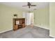 Standard bedroom featuring neutral walls, carpet, and ceiling fan at 4444 Cannon Sw Rd, Loganville, GA 30052