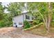 A two-story home with a two-car garage and a well-maintained lawn at 4444 Cannon Sw Rd, Loganville, GA 30052