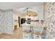 Cozy eat-in kitchen with breakfast bar and ample countertop space for meal preparation at 4444 Cannon Sw Rd, Loganville, GA 30052