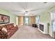 Spacious living room featuring a fireplace and ample natural light at 4444 Cannon Sw Rd, Loganville, GA 30052