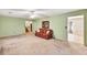 Comfortable living room with a ceiling fan and views of the hallway at 4444 Cannon Sw Rd, Loganville, GA 30052