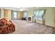 Inviting living room with built-in bookshelves, fireplace, and natural light at 4444 Cannon Sw Rd, Loganville, GA 30052