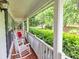 Relaxing porch with seating area to enjoy the garden view at 4444 Cannon Sw Rd, Loganville, GA 30052