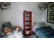 Shared bedroom with two metal beds and a soft decor, creating a comfortable and organized space at 4565 Deerfield Dr, Cumming, GA 30028