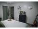 Serene primary bedroom with neutral tones, a large bed, and plenty of natural light at 4565 Deerfield Dr, Cumming, GA 30028