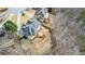 Aerial view of the home's backyard featuring a multi-level deck and wooded lot at 6350 Old Wood Hollow Way, Buford, GA 30518