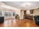 Spacious basement area with a bar, seating, and natural light from windows at 6350 Old Wood Hollow Way, Buford, GA 30518