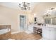 Spacious bathroom with double vanity, soaking tub, shower, and elegant finishes at 6350 Old Wood Hollow Way, Buford, GA 30518