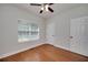 Comfortable bedroom with hardwood floors and natural light at 90 Barrington Grange Dr, Sharpsburg, GA 30277