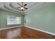 Spacious bedroom featuring hardwood floors, tray ceiling and lots of light at 90 Barrington Grange Dr, Sharpsburg, GA 30277
