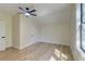 Bright bedroom with hardwood floors, a modern ceiling fan, and a light and airy atmosphere at 1456 S Gordon Sw St, Atlanta, GA 30310
