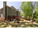 Expansive backyard featuring a deck, landscaping, and a play area for outdoor enjoyment at 4016 Upland Trce, Marietta, GA 30066