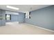 Unfinished basement with neutral carpet and paint, ready for customization and featuring natural light at 4016 Upland Trce, Marietta, GA 30066