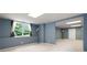 Finished basement with large window and neutral walls offering flexible living space at 4016 Upland Trce, Marietta, GA 30066