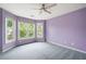 Bright bedroom with large windows and a ceiling fan with views of the yard at 4016 Upland Trce, Marietta, GA 30066