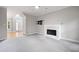 Living room featuring a fireplace, neutral carpet, and entry way at 4016 Upland Trce, Marietta, GA 30066