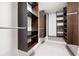 A spacious walk-in closet features custom wood shelving and provides ample storage space at 4016 Upland Trce, Marietta, GA 30066
