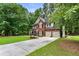 Beautiful two-story home with a two-car garage and long private driveway at 4401 Madison Woods Nw Dr, Marietta, GA 30064