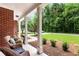 Inviting front porch with comfortable seating, ideal for enjoying a peaceful afternoon at 4401 Madison Woods Nw Dr, Marietta, GA 30064
