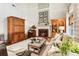 Cozy living room features a fireplace, built-in shelving, and comfortable seating at 4401 Madison Woods Nw Dr, Marietta, GA 30064