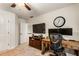 Functional office space with a modern desk setup, two monitors, and ample storage; perfect for remote work at 4401 Madison Woods Nw Dr, Marietta, GA 30064