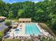 Overhead view of a community swimming pool with lounge chairs and mature landscaping at 4401 Madison Woods Nw Dr, Marietta, GA 30064