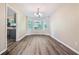 Spacious dining area with stylish flooring and large windows at 4464 Idlewood Park, Lithonia, GA 30038