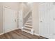 Spacious foyer with beautiful flooring and staircase leading to the upper level at 4464 Idlewood Park, Lithonia, GA 30038