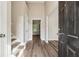 Inviting foyer with soaring ceiling, attractive flooring and staircase at 4464 Idlewood Park, Lithonia, GA 30038