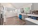 Modern kitchen featuring stylish flooring, granite countertops and stainless steel appliances at 4464 Idlewood Park, Lithonia, GA 30038
