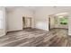 Open living room features hardwood floors, natural light and great views of dining room at 4464 Idlewood Park, Lithonia, GA 30038