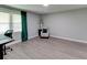 Living room with gray walls, wood-look flooring, and modern decor at 1863 Rockford Ct, Riverdale, GA 30296
