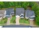 Desirable neighborhood with manicured lawns, mature trees, and sidewalks, offering curb appeal and community charm at 2940 Bentbill Xing, Cumming, GA 30041