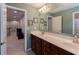 Spacious bathroom featuring a double sink vanity and framed wall art at 2940 Bentbill Xing, Cumming, GA 30041
