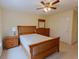 Bedroom with bed, window, and ceiling fan at 2940 Bentbill Xing, Cumming, GA 30041