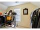 This closet features organized clothing racks, shelving, and storage for personal items at 2940 Bentbill Xing, Cumming, GA 30041