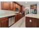 Well-equipped kitchen with stainless steel appliances and lots of counter space at 2940 Bentbill Xing, Cumming, GA 30041