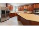 Spacious kitchen boasts stainless steel appliances and a large island at 2940 Bentbill Xing, Cumming, GA 30041