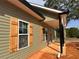 Exterior shot showing shutters and newly installed siding and foundation at 389 Campground School Rd, Dallas, GA 30157