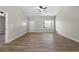 Bright room with plenty of space, a new door, and modern flooring at 389 Campground School Rd, Dallas, GA 30157