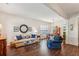 Inviting living room with hardwood floors, neutral walls, and comfortable seating arrangements at 4020 Emerald Glade Ct, Cumming, GA 30040