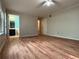 Bedroom with hardwood floors and an ensuite bathroom at 1035 Towne Manor Nw Ct, Kennesaw, GA 30144